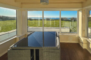 Garden room at Booby's Bay Cottage with grassed garden views