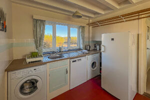Domestic appliances in the utility at Booby's Bat Cottage