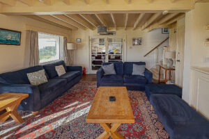Lounge with ample seating at Booby's Bay Cottage