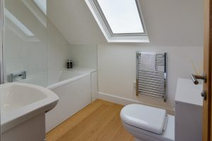 Ensuite bathroom in first floor master bedroom at Beachcombers