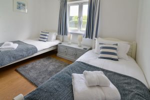 Twin first floor bedroom at Beachcombers