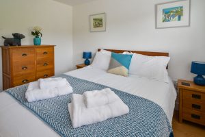 King sized bedroom at Beachcombers