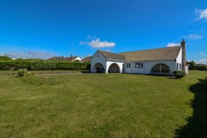 Front view of Bosporthennis from front grassed garden