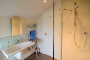 Ensuite bathroom from bedroom 2 with walk in shower at Cheyney