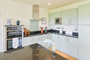 Well equipped kitchen at Curlews with induction hob and double oven