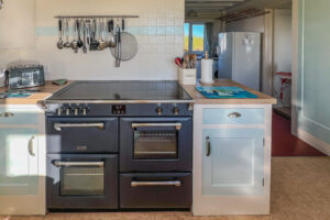 Large range oven in well equipped kitchen at Booby's Bay Cottage