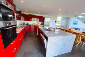 Well equipped open plan kitchen at Cheyney with large island