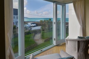 Sea Views through double doors with glass Juliette balcony at Apartment 5 Greenwaves