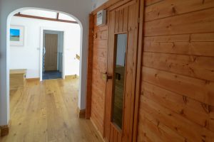 First floor hallway with Sauna at Aquataine Lodge