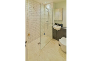 Ensuite bathroom from bedroom 3 with walk in shower on ground floor at Blue Seas