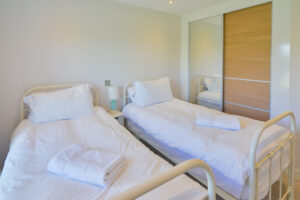 Twin ensuite ground floor bedroom at Blue Seas with option of Superking