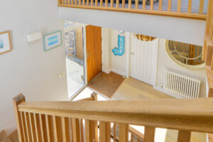 View from staircase onto front entrance of Blue Seas