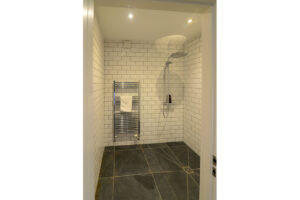 Walk in shower room on ground floor at Blue Seas