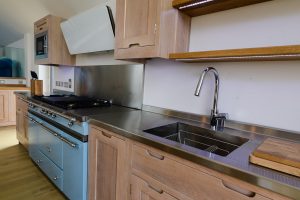 Sink and stainless steel surfaces in kitchen at Blue Seas