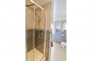 Bathroom at Carnavis Cottage with separate shower
