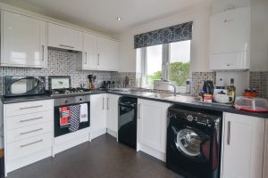 Well equipped kitchen at Carnavis Cottage with integrated oven and gas hob