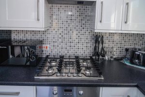 Gas hob in kitchen at Carnavis Cottage