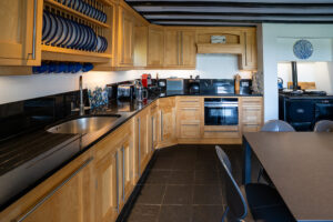 Spacious kitchen at Morvoren with AGA and integrated oven