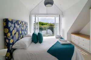 Kingsize bedroom at Herongate with bifold doors and juliet balcony