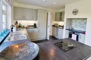 Herongate kitchen with hob, inset oven and sink