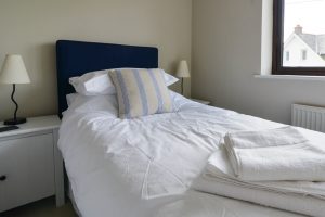 Twin ensuite bedroom on first floor at High Tides