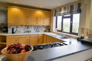 Well equipped kitchen with gas hob at High Tides