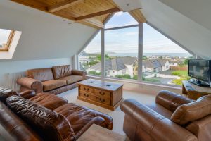 Views of Trevone from large windows in the lounge at Highview