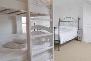 First floor king ensuite bedroom with additional bunk beds at Highview. The bunk beds are made up only if requested