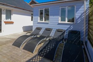 Sun loungers on the decking at Highview