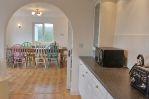 Well equipped kitchen at Highview leading into dining area