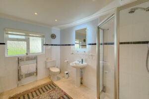 Ensuite from the superking bedroom showing shower, wash hand basin and toilet