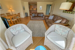 View of open plan lounge, dining area leading to kitchen at Apartment 5 Greenwaves