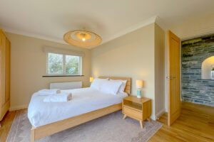 Ground floor King sized bedroom at Aquataine Lodge