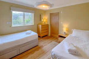 First floor twin bedroom at Aquataine Lodge