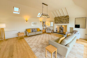 Lounge at Aquataine Lodge with log burner