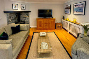 Lounge area at Penjerrick with TV and seating