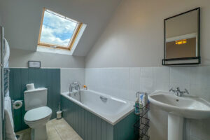 Ensuite bathroom at Penjerrick with bath, toilet and wash hand basin