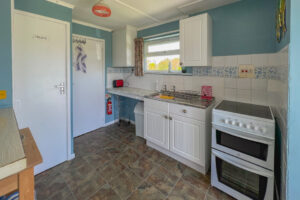 Kitchen at Thalassa with sink and oven