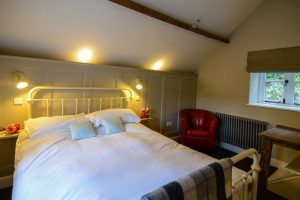 King sized bedroom on the first floor at Pensile House Cottage