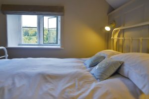 King sized bedroom on the first floor at Pensile House Cottage