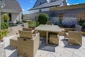 Patio area to the rear of Parc Vean with table and chairs