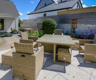 Patio area to the rear of Parc Vean with table and chairs