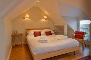 King bed in the master ensuite bedroom on the first floor at Parc Vean