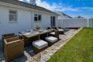 Rear patio at Penamont with outside dining furniture