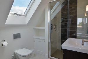 En suite bathroom with walk in shower from Bedroom 1 at Pendoric