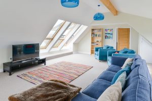 First floor lounge with large Velux windows at Pendoric