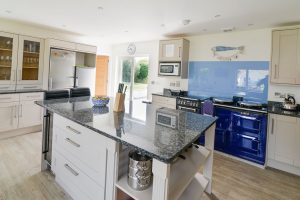 Well equipped kitchen with AGA and island at Pendoric