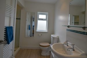 En suite bathroom with shower from Bedroom 2 at Pendoric