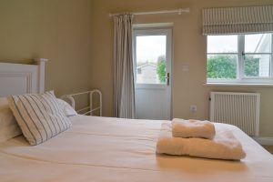 External door in the twin ground floor bedroom at Penpor
