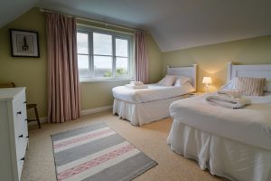 Twin bedroom on the first floor at Penpor